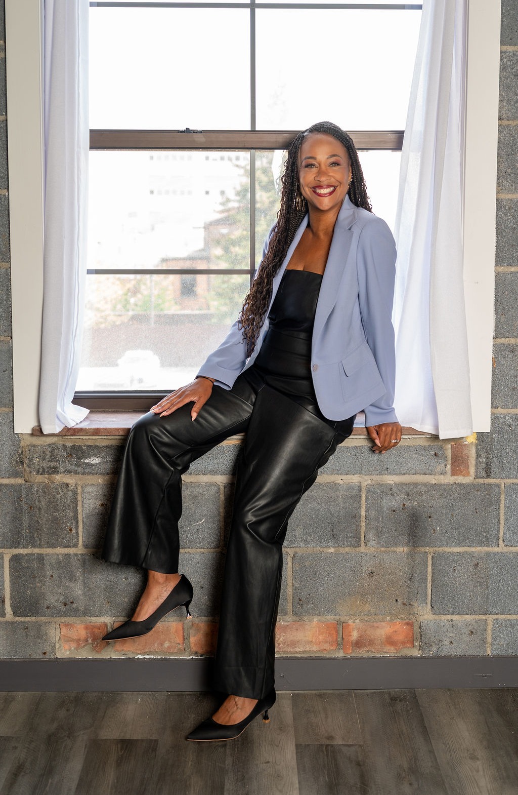 Alycia M. Huston, professional speaker and founder of The Culture Cru